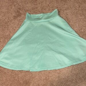 Aquamarine colored mini skirt